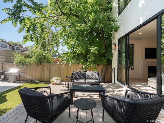 332 S Franklin St, Denver, CO 80209 - deck with outdoor lounge area and a grill