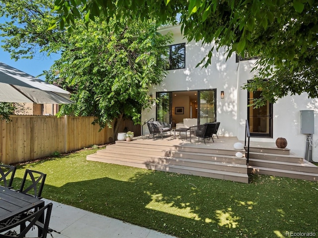 332 S Franklin St, Denver, CO 80209 - back of house featuring a wooden deck, stucco siding, and outdoor dining area