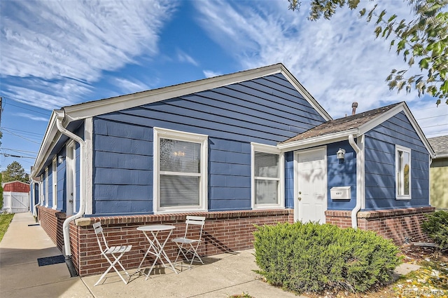 view of front of home with a patio area