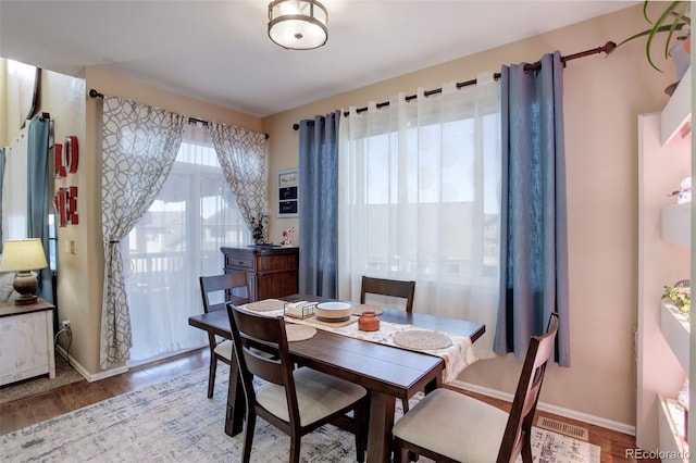 dining area featuring light hardwood / wood-style floors