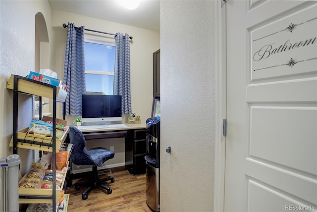 office area with light wood-type flooring