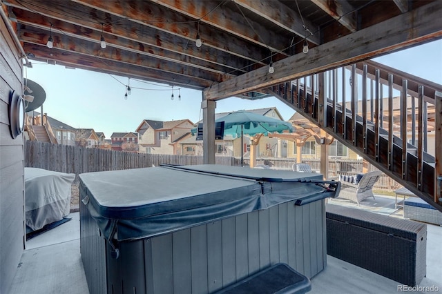 view of patio featuring a hot tub