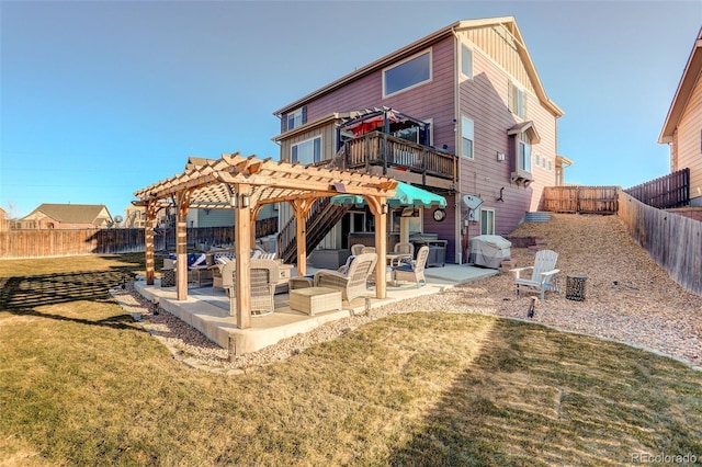 back of house with a yard, an outdoor hangout area, a pergola, and a patio area