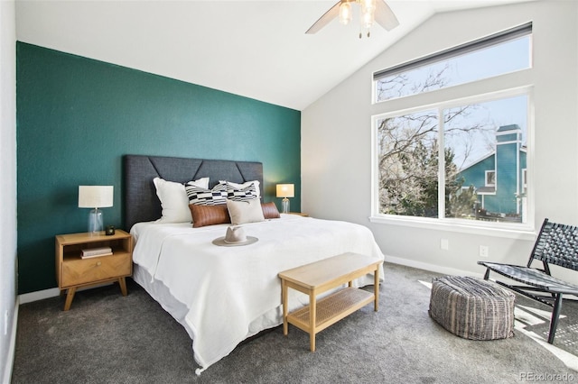 bedroom featuring baseboards, carpet flooring, a ceiling fan, and vaulted ceiling