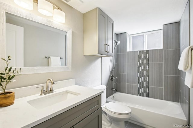 full bathroom featuring vanity, toilet, shower / tub combination, and visible vents