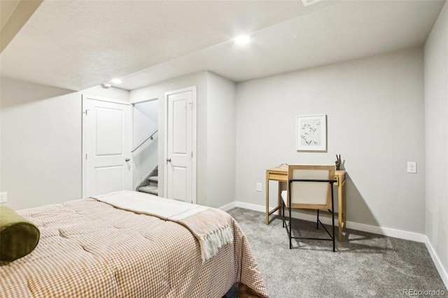 carpeted bedroom with baseboards and recessed lighting