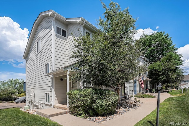 19192 E Wyoming Pl Unit 105, Aurora, CO 80017 - view of property exterior featuring a yard