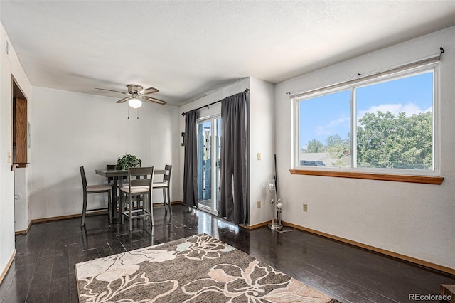 19192 E Wyoming Pl Unit 105, Aurora, CO 80017 - dining room with hardwood / wood-style floors and ceiling fan