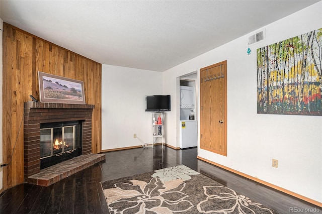 19192 E Wyoming Pl Unit 105, Aurora, CO 80017 - living room featuring a fireplace and wood finished floors