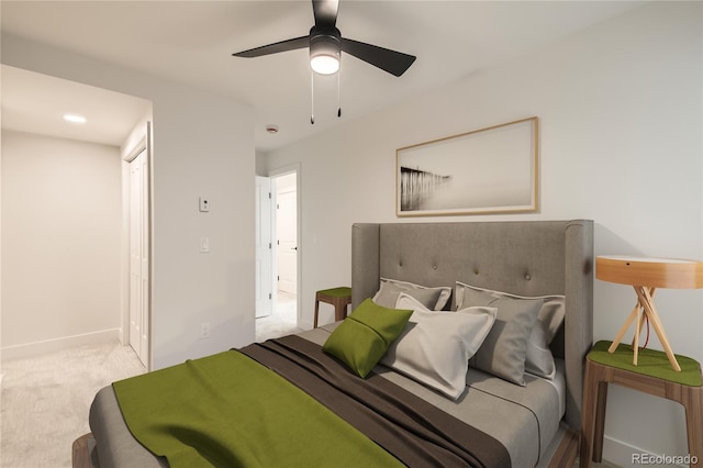 bedroom featuring carpet, baseboards, and a ceiling fan