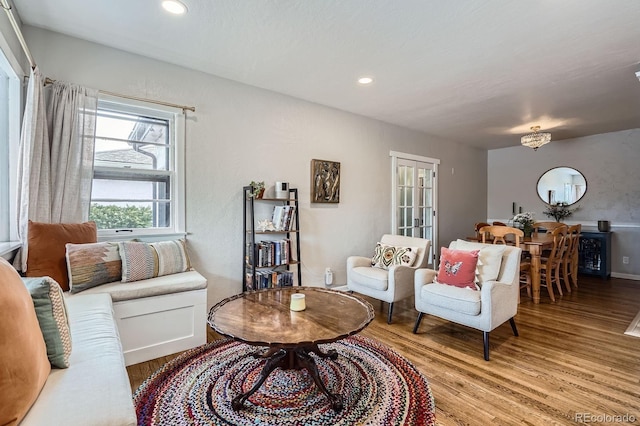 living room featuring recessed lighting and wood finished floors