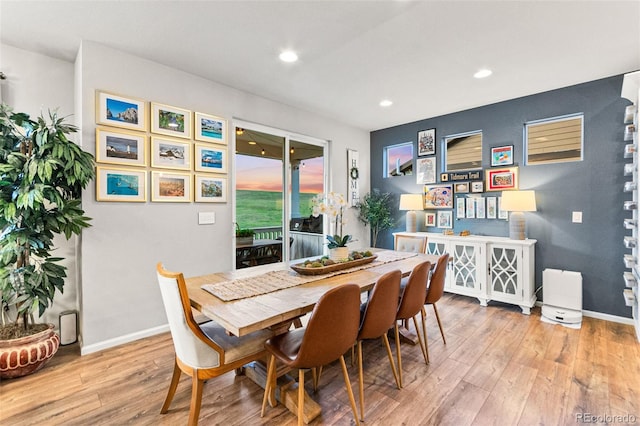 17335 W 94th Ave, Arvada, CO 80007 - dining area featuring light wood-style floors, baseboards, and recessed lighting