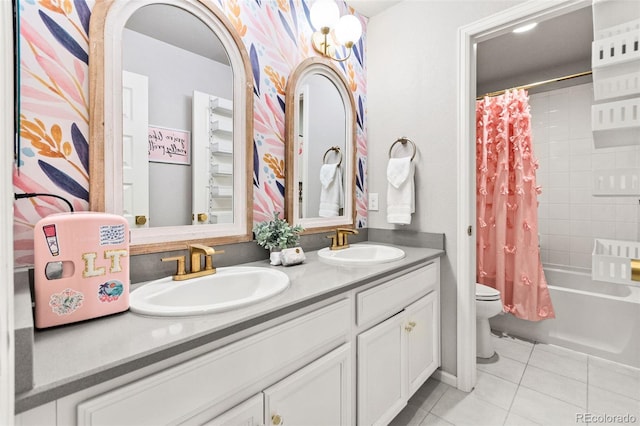 17335 W 94th Ave, Arvada, CO 80007 - full bath with tile patterned flooring, toilet, double vanity, and shower / tub combo