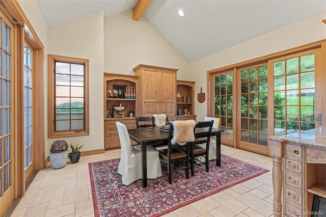 dining room featuring high vaulted ceiling, beam ceiling, and french doors