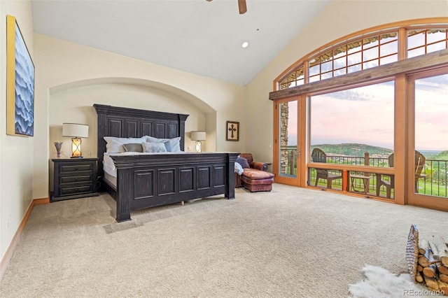 carpeted bedroom with lofted ceiling, access to exterior, and ceiling fan