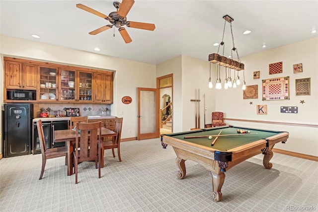 recreation room featuring ceiling fan, billiards, and light carpet