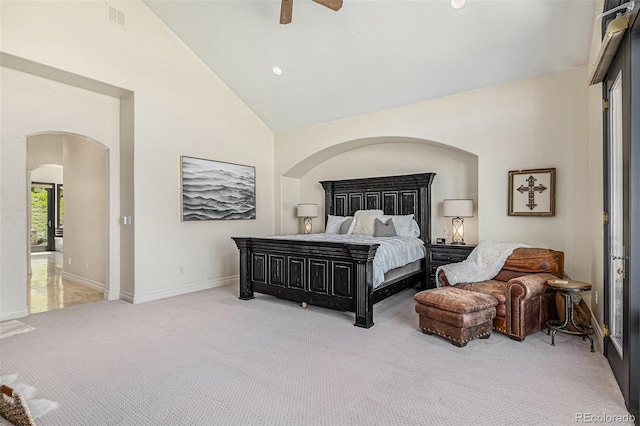 12963 Silver Elk Ln, Littleton, CO 80127 - carpeted bedroom featuring arched walkways, high vaulted ceiling, ceiling fan, and baseboards