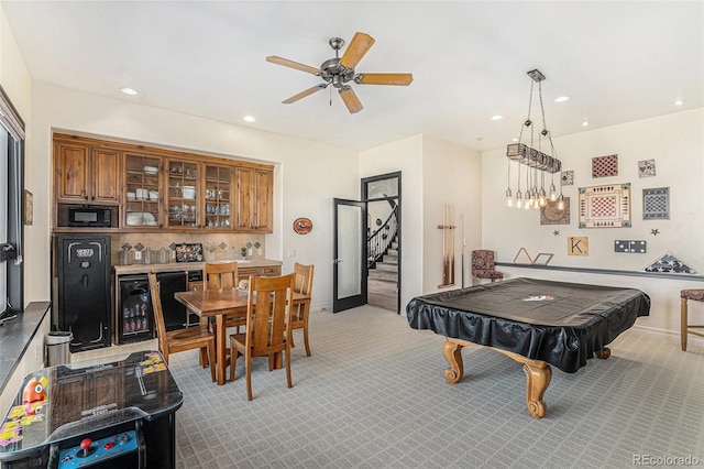 12963 Silver Elk Ln, Littleton, CO 80127 - recreation room featuring light colored carpet, a ceiling fan, recessed lighting, baseboards, and pool table