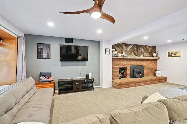 10378 W Weaver Ave, Littleton, CO 80127 - living room featuring carpet flooring, ceiling fan, recessed lighting, and a wood stove