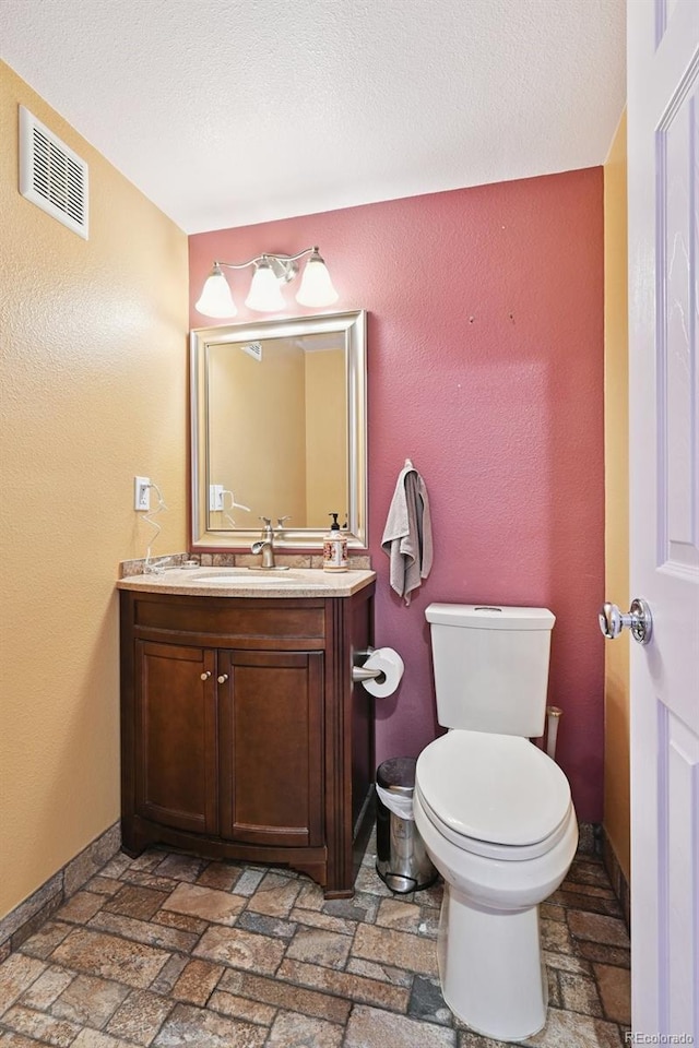 10378 W Weaver Ave, Littleton, CO 80127 - bathroom featuring vanity and toilet