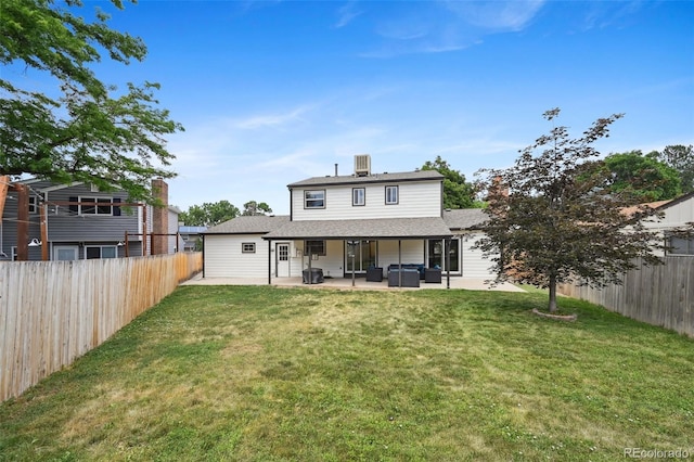 10378 W Weaver Ave, Littleton, CO 80127 - back of house featuring an outdoor living space, a patio, a fenced backyard, a shingled roof, and a chimney