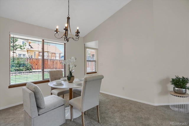 12089 W Burgundy Ave, Littleton, CO 80127 - dining area with a chandelier, carpet, plenty of natural light, and vaulted ceiling