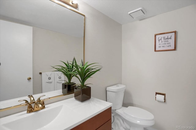 12089 W Burgundy Ave, Littleton, CO 80127 - bathroom featuring vanity and toilet