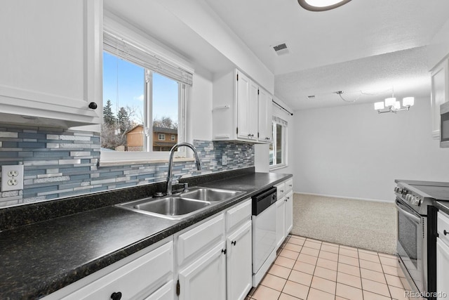 kitchen with sink, white dishwasher, light colored carpet, stainless steel range with electric stovetop, and white cabinets