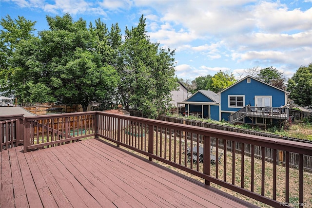 12632 James Ct, Broomfield, CO 80020 - wooden terrace featuring a fenced backyard