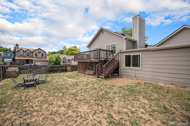 12632 James Ct, Broomfield, CO 80020 - fenced backyard with stairs and a deck