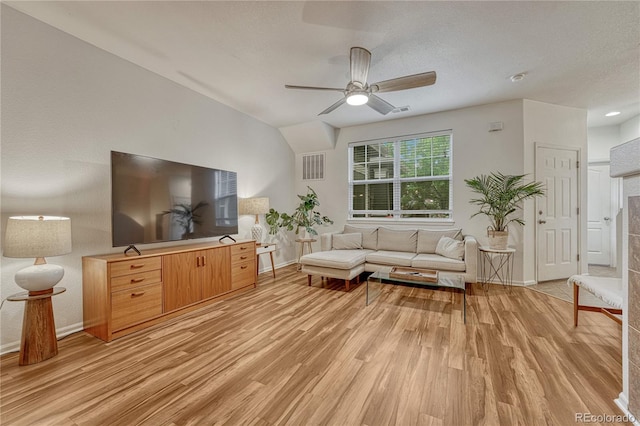 7140 Simms St Unit 102, Arvada, CO 80004 - living area featuring light wood-type flooring, baseboards, and a ceiling fan