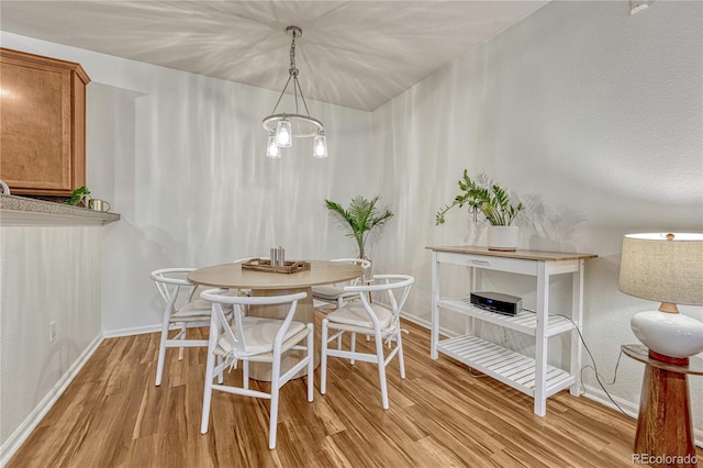 7140 Simms St Unit 102, Arvada, CO 80004 - dining space with light wood finished floors and baseboards