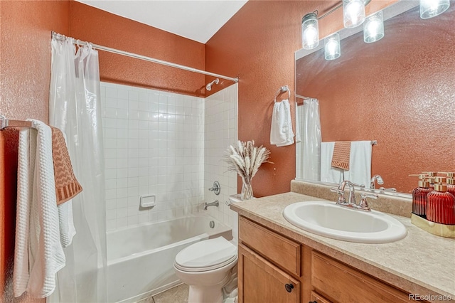 7140 Simms St Unit 102, Arvada, CO 80004 - bathroom with a textured wall, shower / bath combo with shower curtain, vanity, and toilet