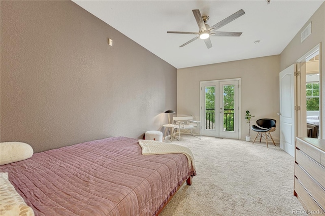 7140 Simms St Unit 102, Arvada, CO 80004 - bedroom featuring access to outside, multiple windows, carpet floors, vaulted ceiling, and ceiling fan