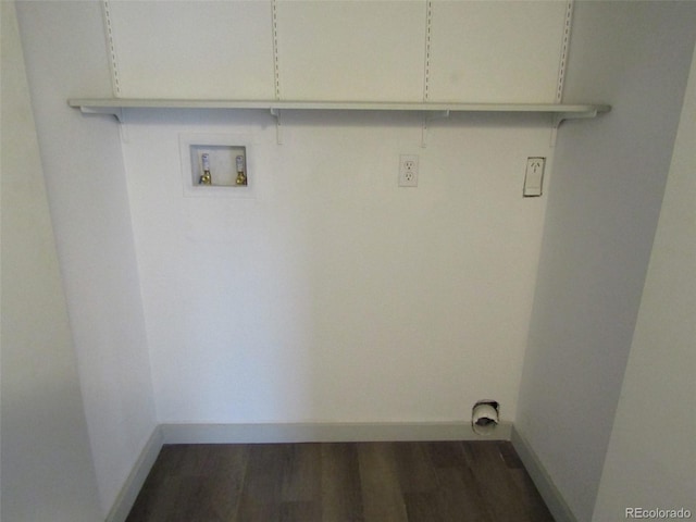 washroom with washer hookup and dark hardwood / wood-style floors