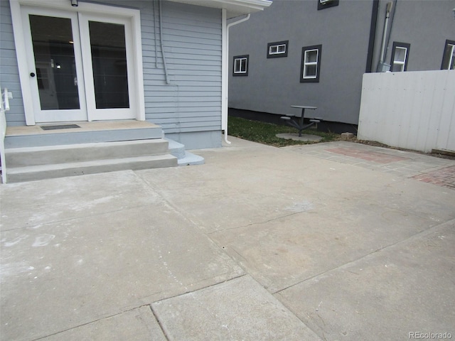 view of patio featuring french doors