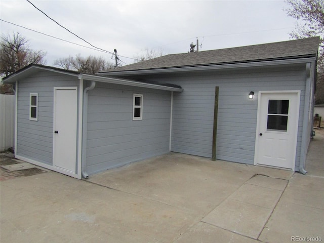 rear view of house with a patio