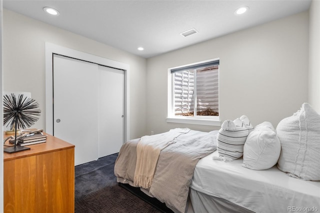 5101 Quitman St, Denver, CO 80212 - bedroom with dark colored carpet, a closet, and recessed lighting