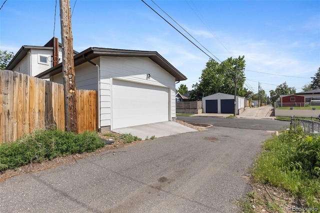 5101 Quitman St, Denver, CO 80212 - view of side of property with a detached garage
