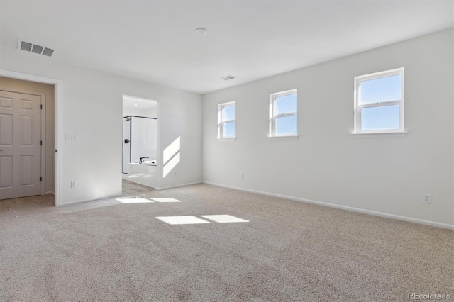 view of carpeted spare room