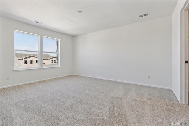 view of carpeted spare room