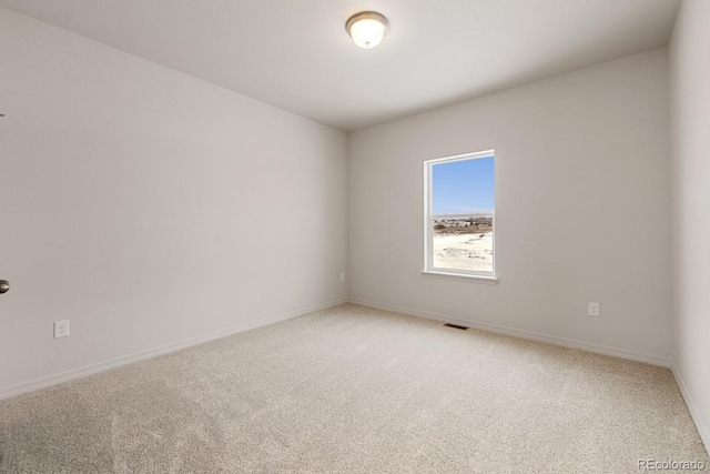 view of carpeted spare room