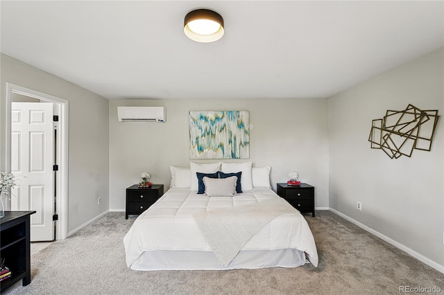 carpeted bedroom featuring an AC wall unit and baseboards