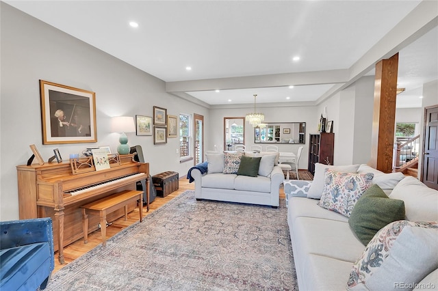 living area with recessed lighting and wood finished floors