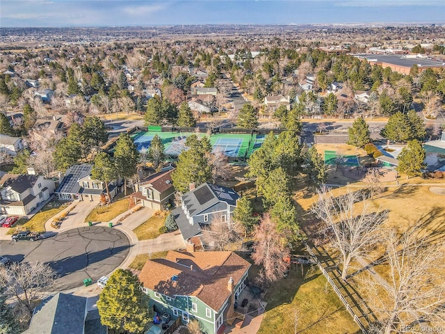 birds eye view of property with a residential view