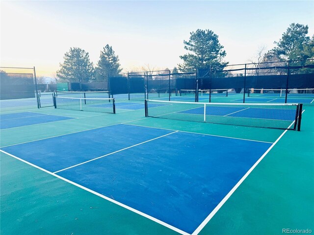 view of sport court with fence