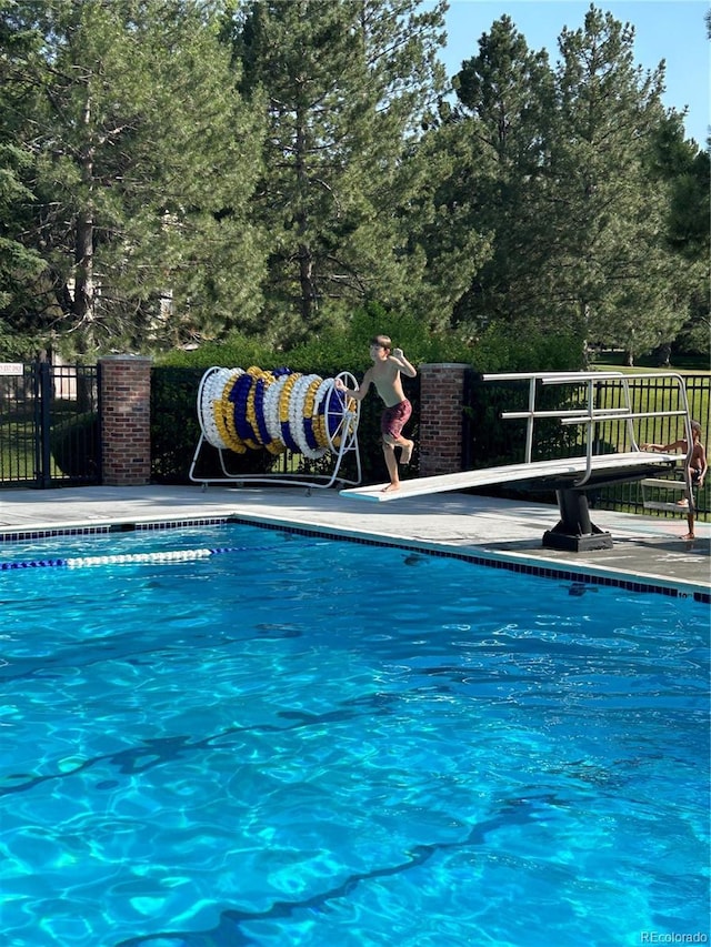 pool featuring fence