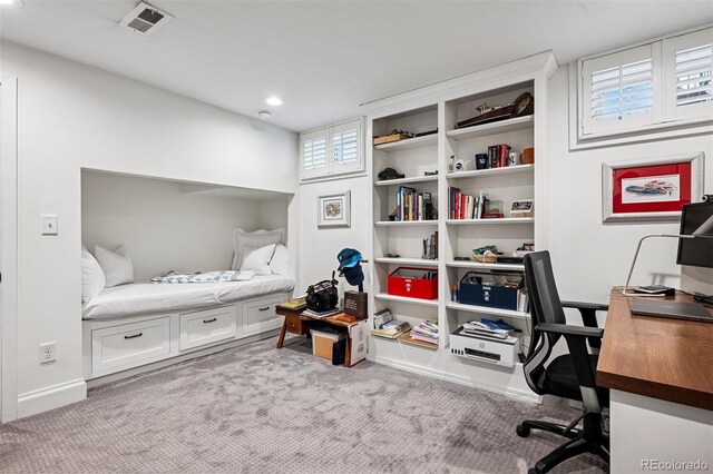 carpeted office space with recessed lighting