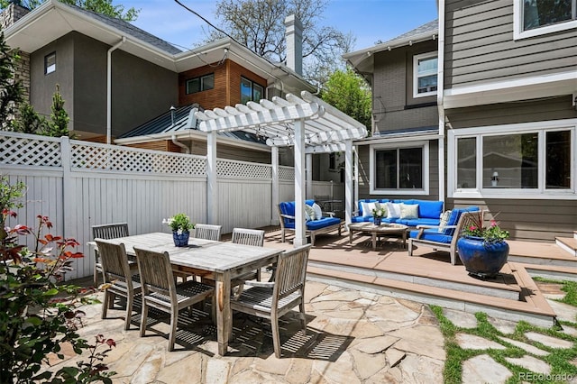 view of patio / terrace featuring outdoor lounge area, a pergola, a fenced backyard, a deck, and outdoor dining area