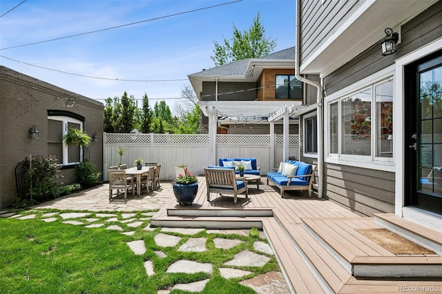 wooden deck with an outdoor hangout area, a pergola, and entry steps